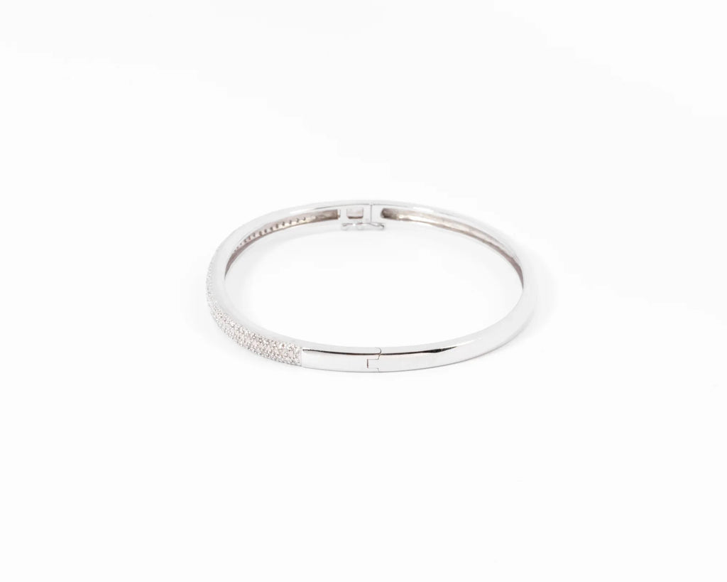 Rigid white gold diamond-set hinged bracelet