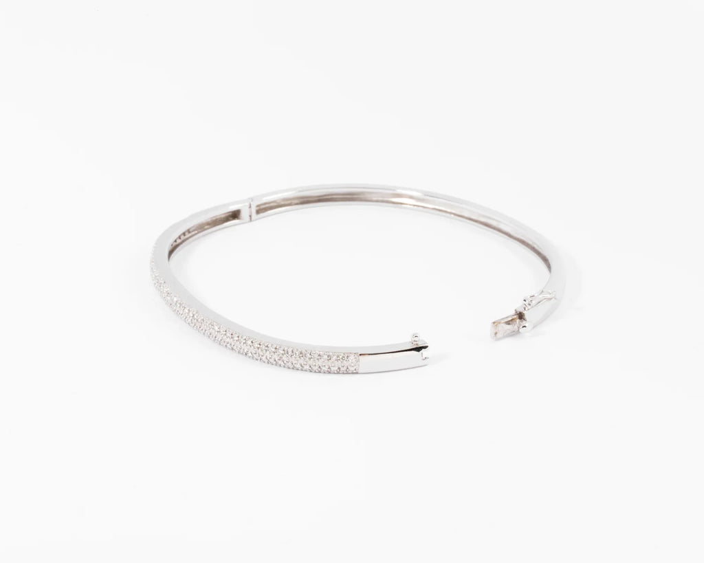 Rigid white gold diamond-set hinged bracelet