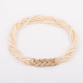 Multi-strand pearl necklace with diamond clasp