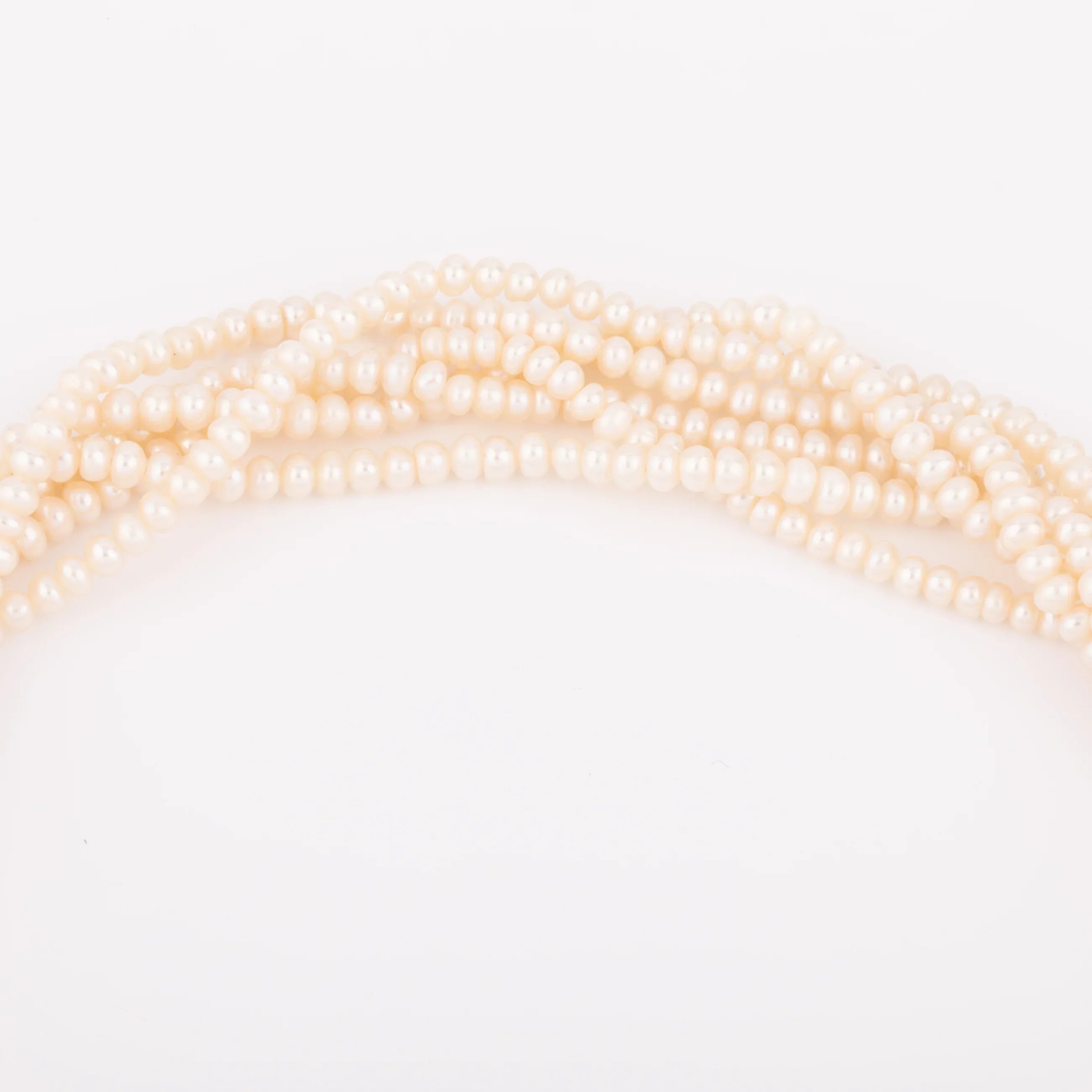 Multi-strand pearl necklace with diamond clasp