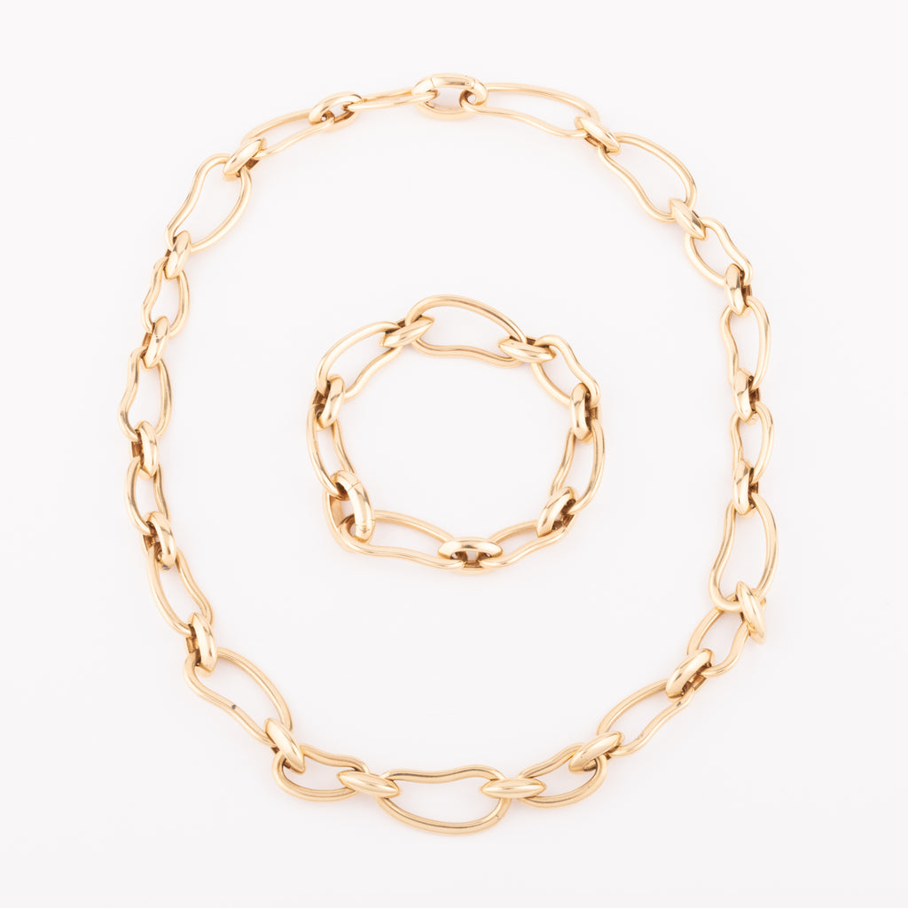 Pomellato yellow gold necklace and bracelet, Paisley model