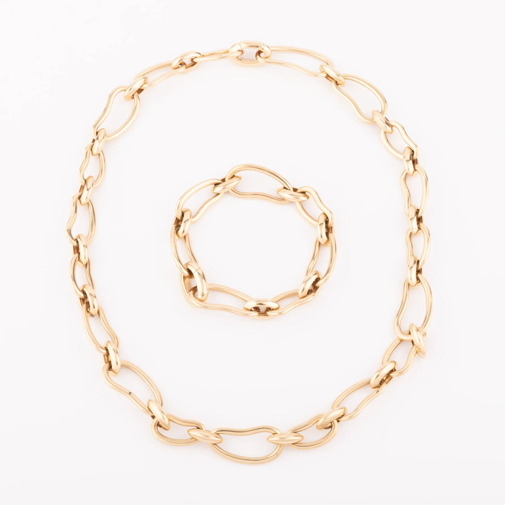 Pomellato yellow gold necklace and bracelet, Paisley model