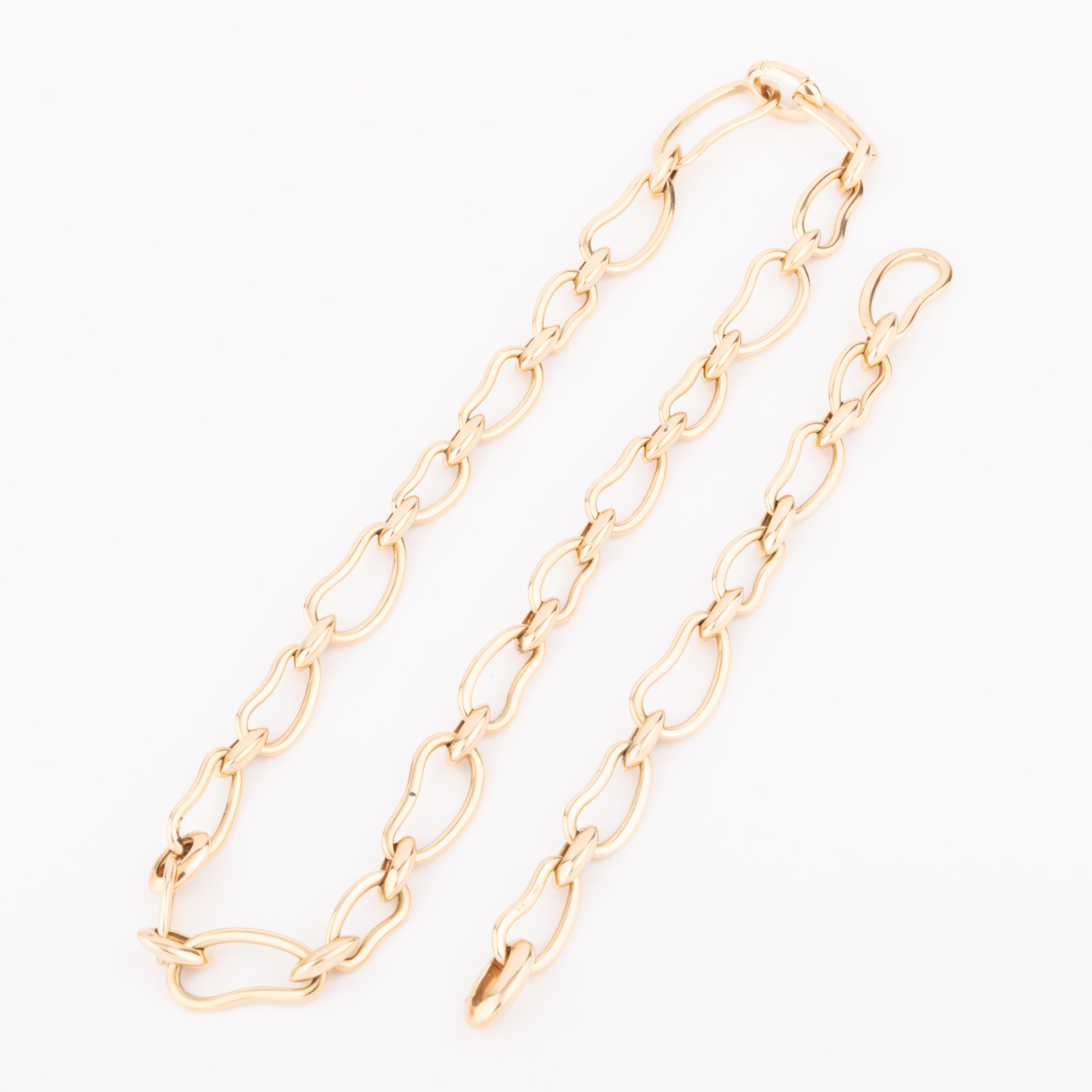 Pomellato yellow gold necklace and bracelet, Paisley model