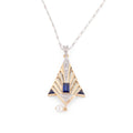 Pendentif en or et platine à décor géométrique