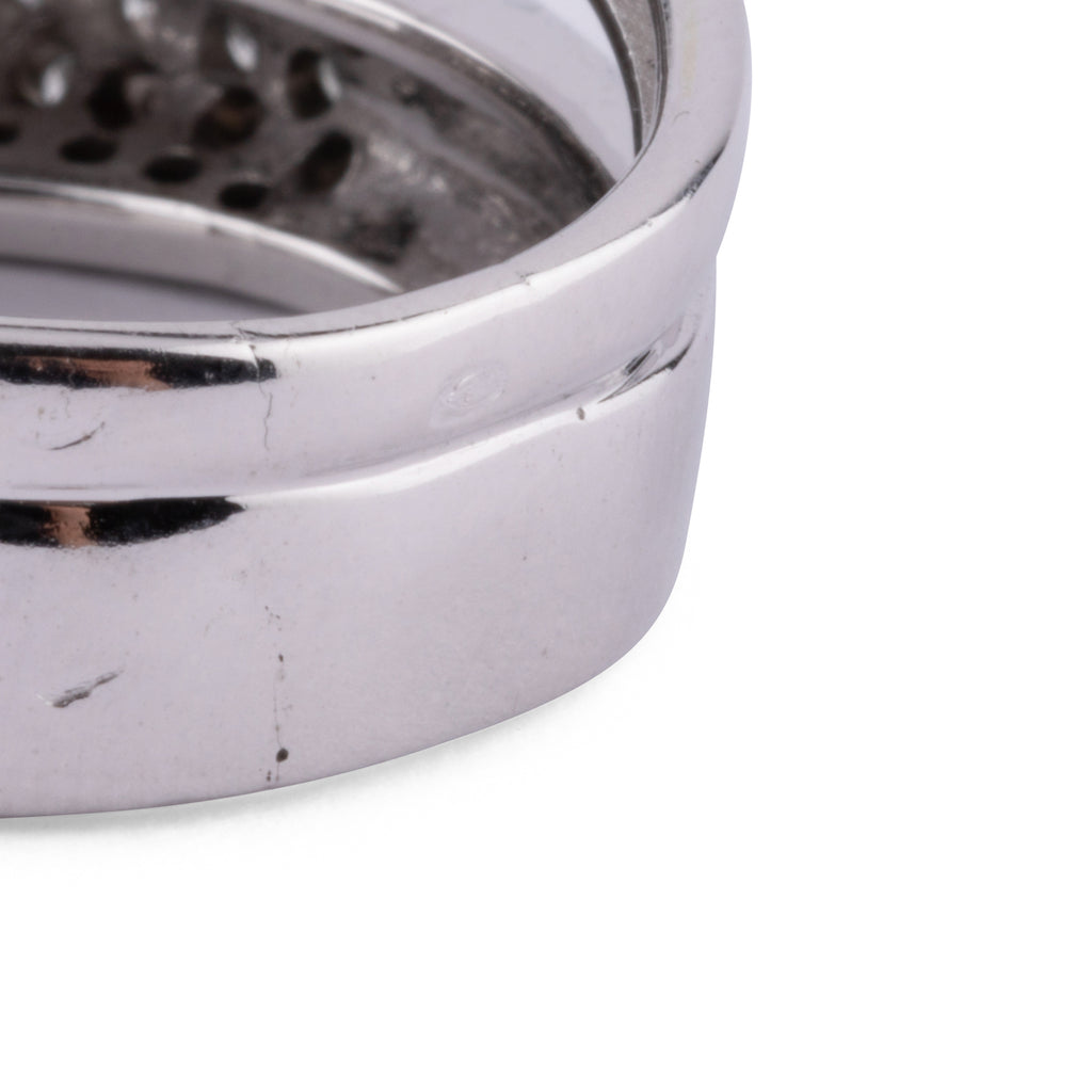 Asymmetrical white gold and diamond ring