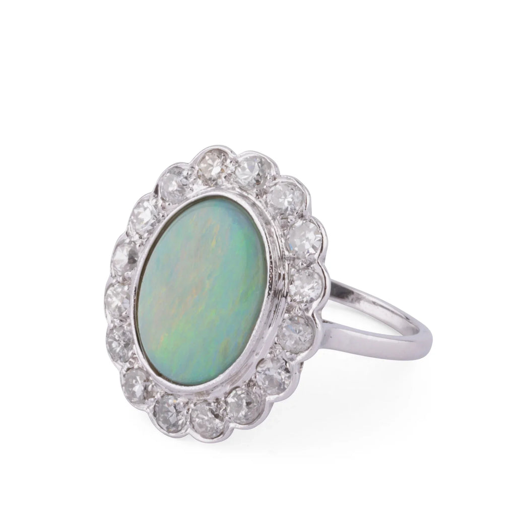 Platinum diamond and opal ring