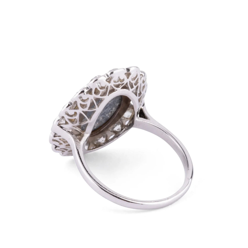 Platinum diamond and opal ring