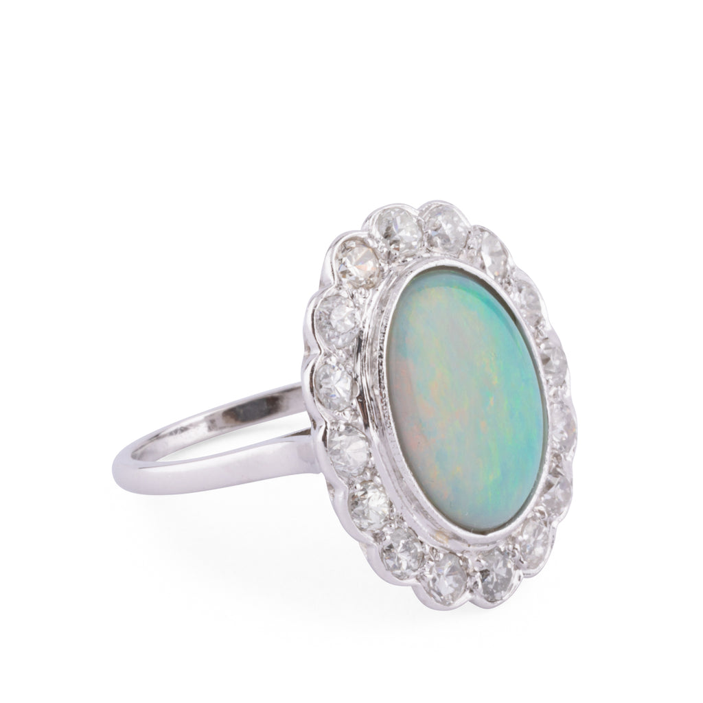 Platinum diamond and opal ring