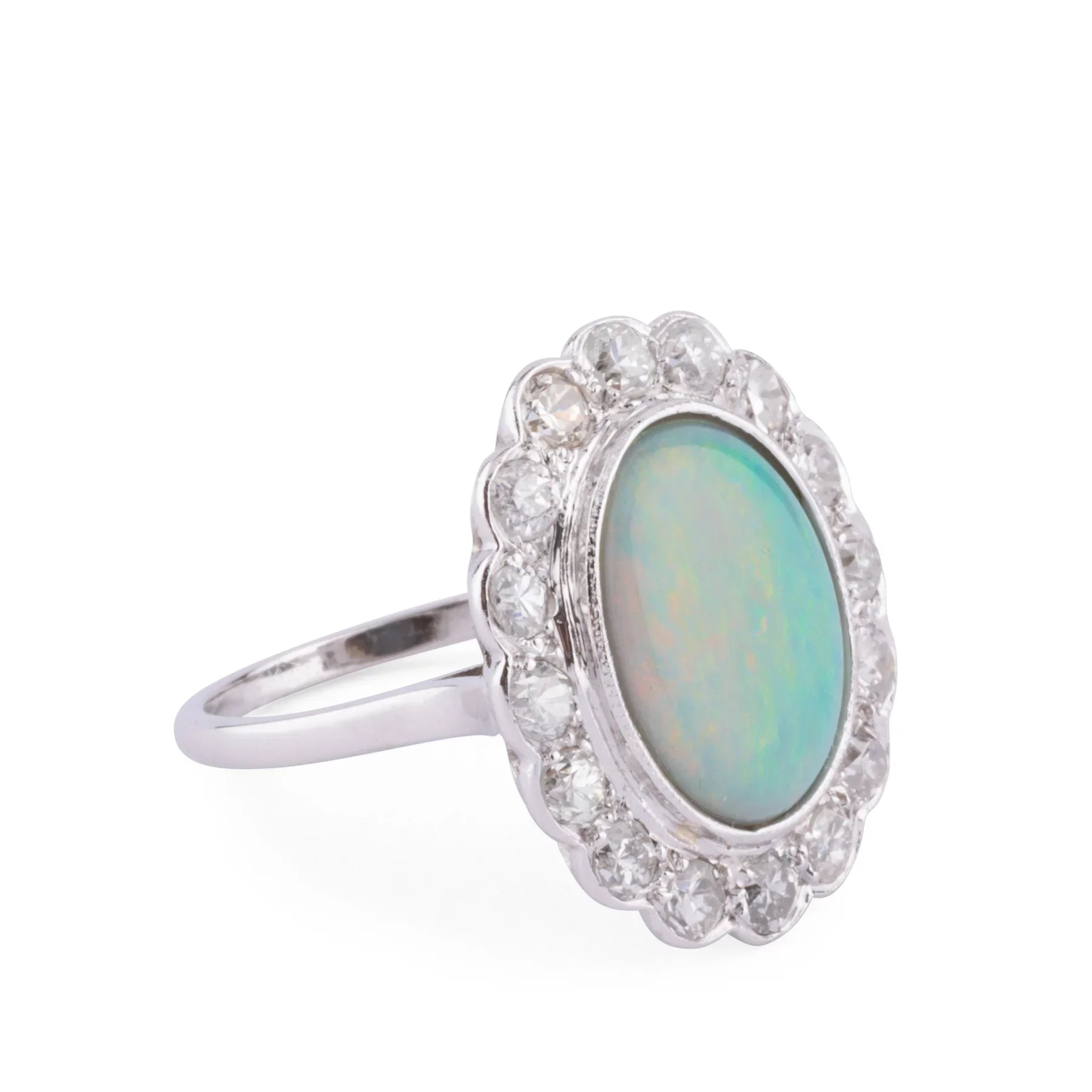 Platinum diamond and opal ring