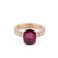 Yellow gold ring with ruby and princess cut diamonds
