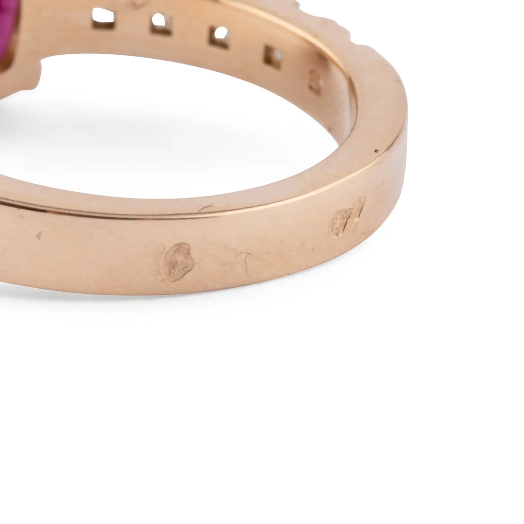 Yellow gold ring with ruby and princess cut diamonds