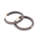 Boucles d'oreilles forme créole sur or 14 k et argent noirci pavées diamants cognacs