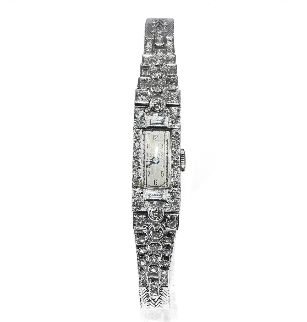 Montre en platine et diamants Art Deco - adalgyseboutique