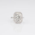 Platinum ring adorned in its center with an old-cut diamond