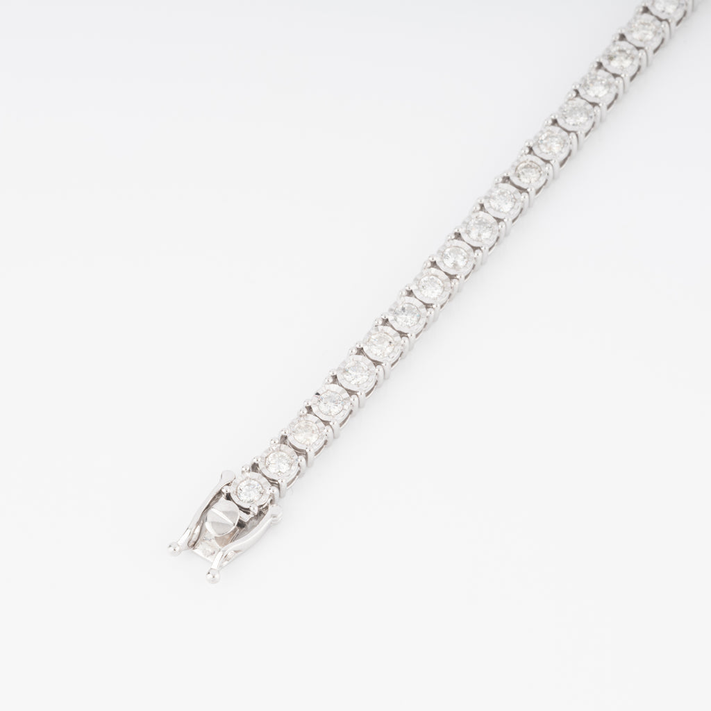 Bracelet riviere et or gris orné de diamant
