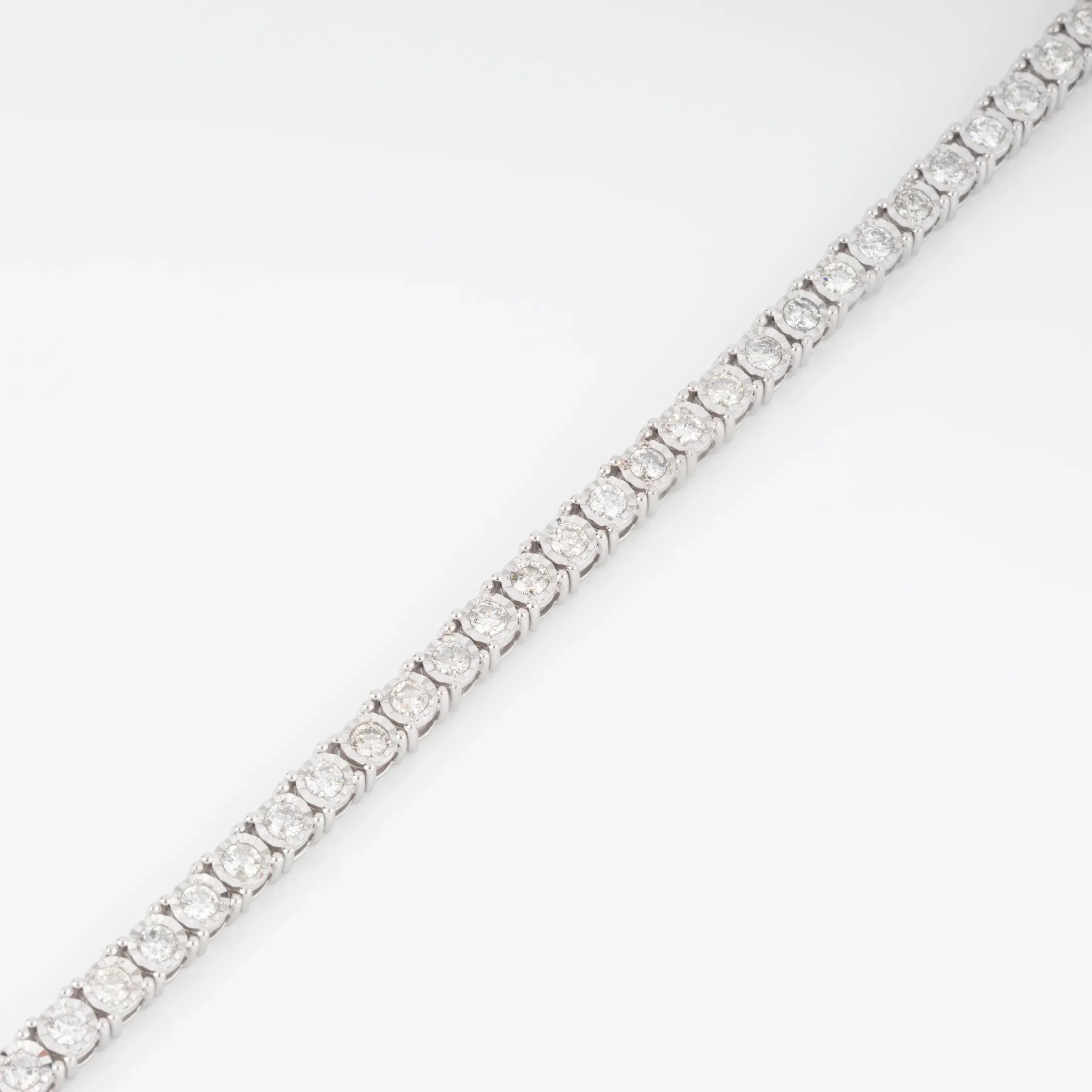 Bracelet riviere et or gris orné de diamant