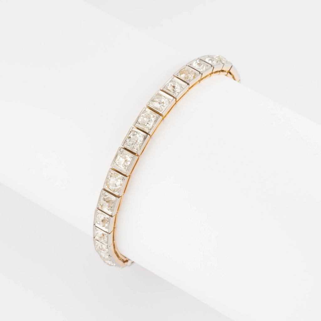 Bracelet riviere or et platine orné de diamant taille brillant