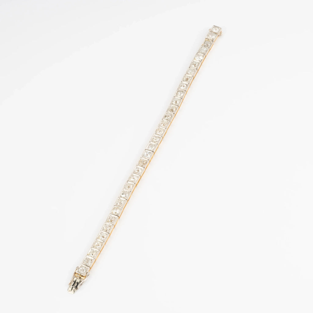 Bracelet riviere or et platine orné de diamant taille brillant