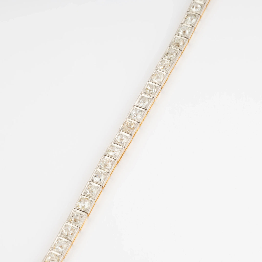 Bracelet riviere or et platine orné de diamant taille brillant