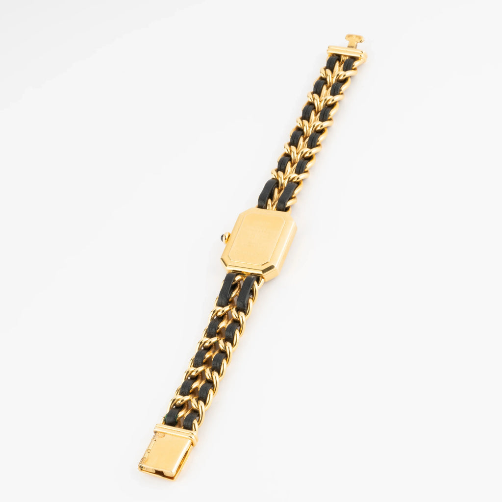 Montre en métal doré ma première de Chanel