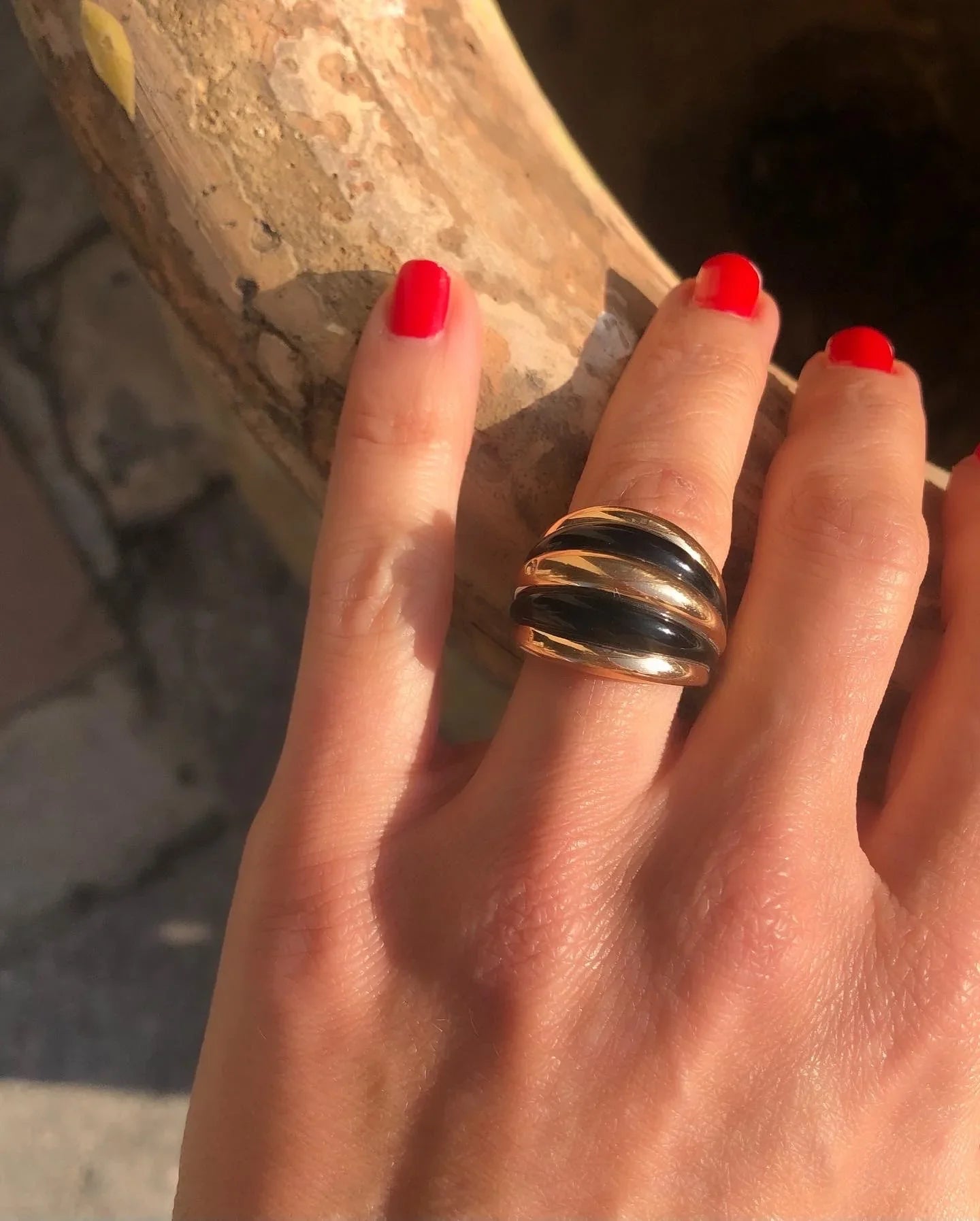 Damiani pink gold and onyx band ring