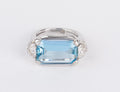 White gold ring set with an aquamarine and diamonds