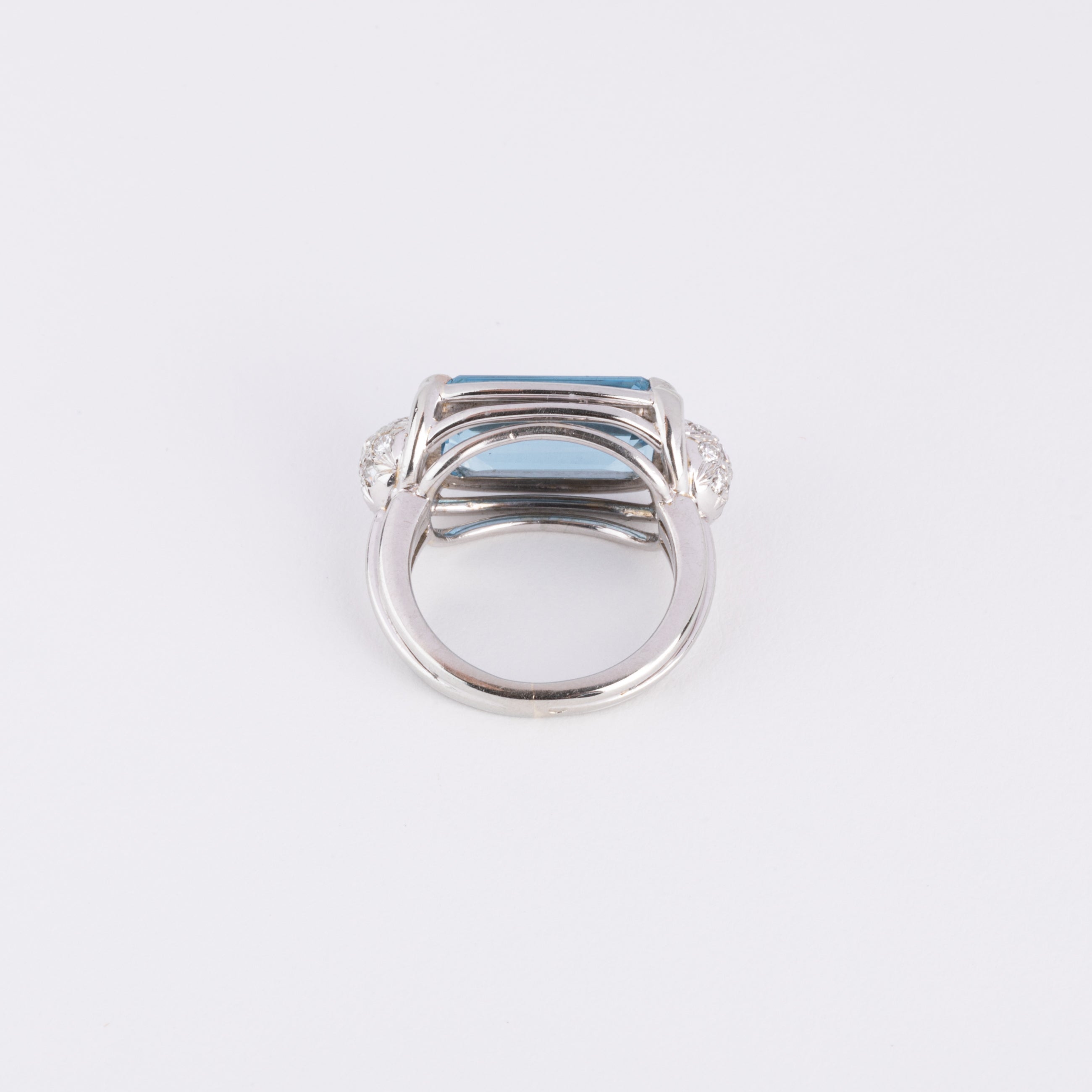 White gold ring set with an aquamarine and diamonds