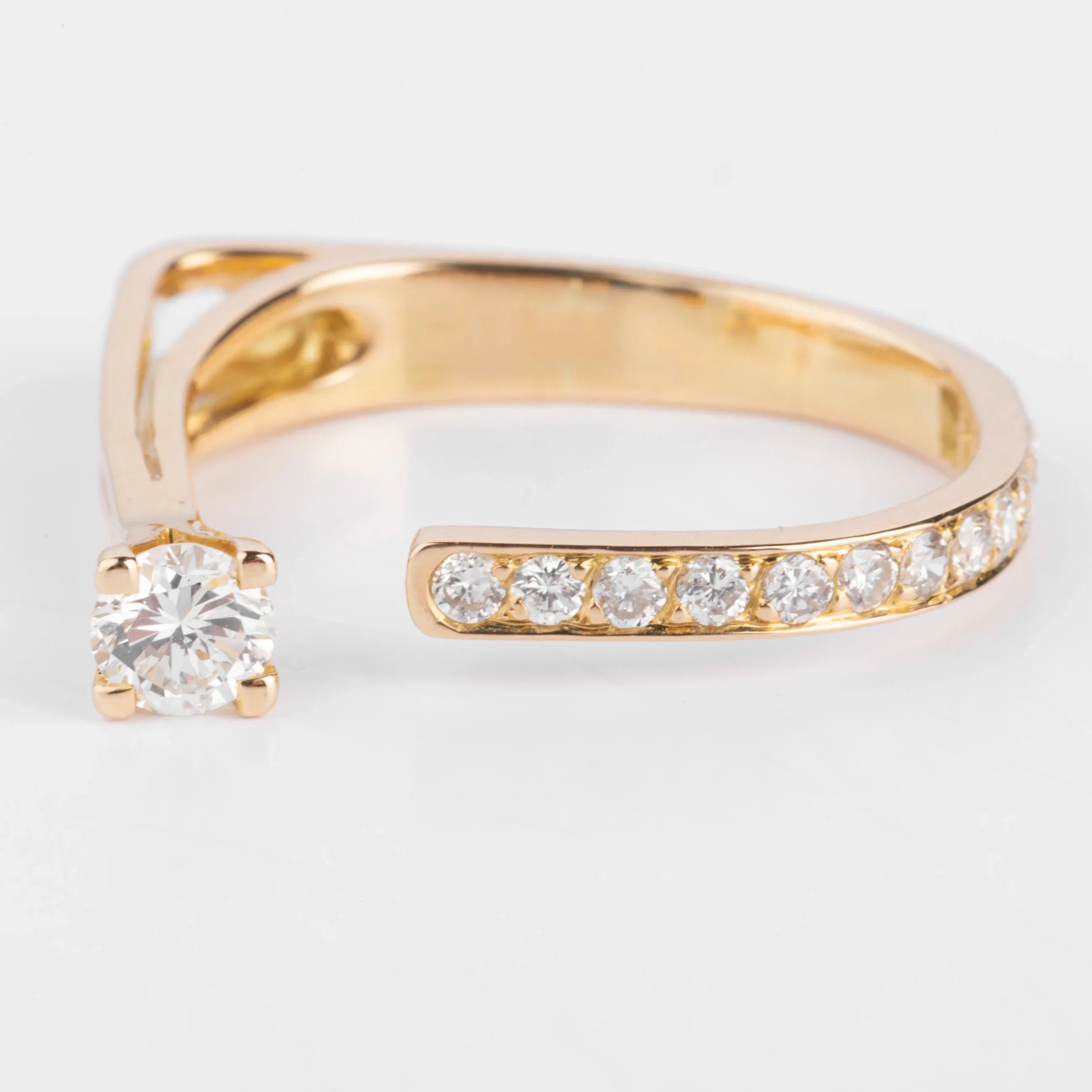 Open yellow gold and diamond design ring
