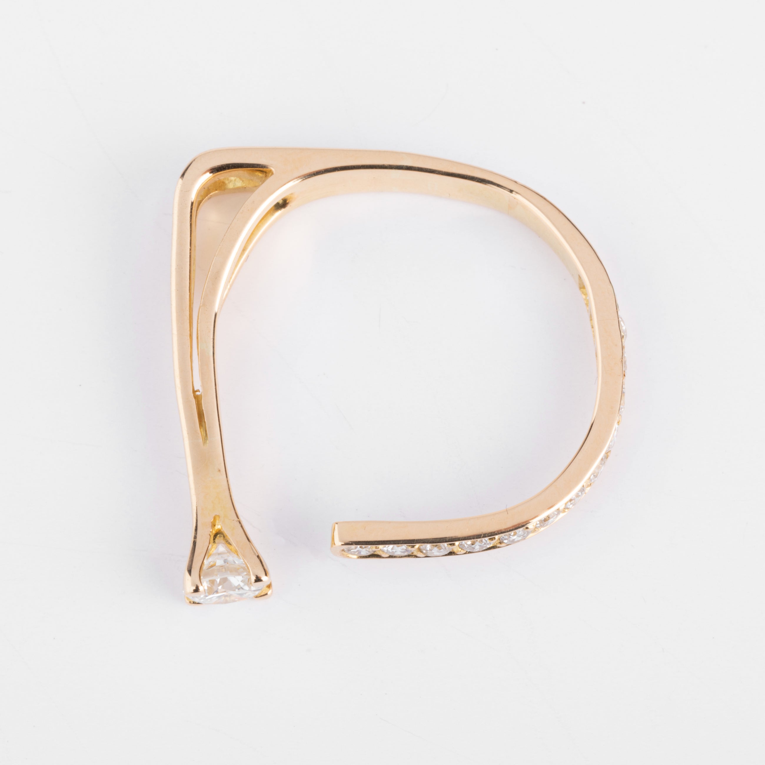 Open yellow gold and diamond design ring