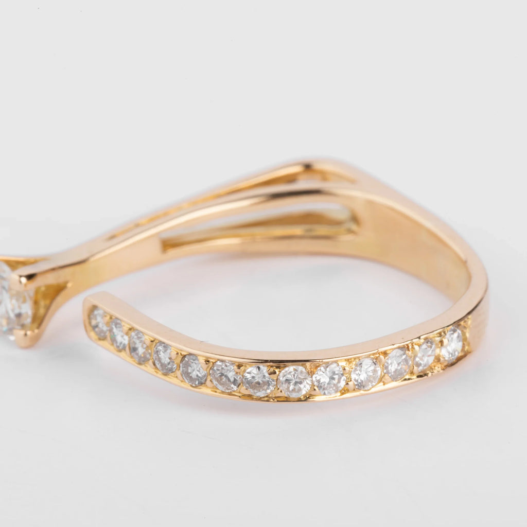 Open yellow gold and diamond design ring