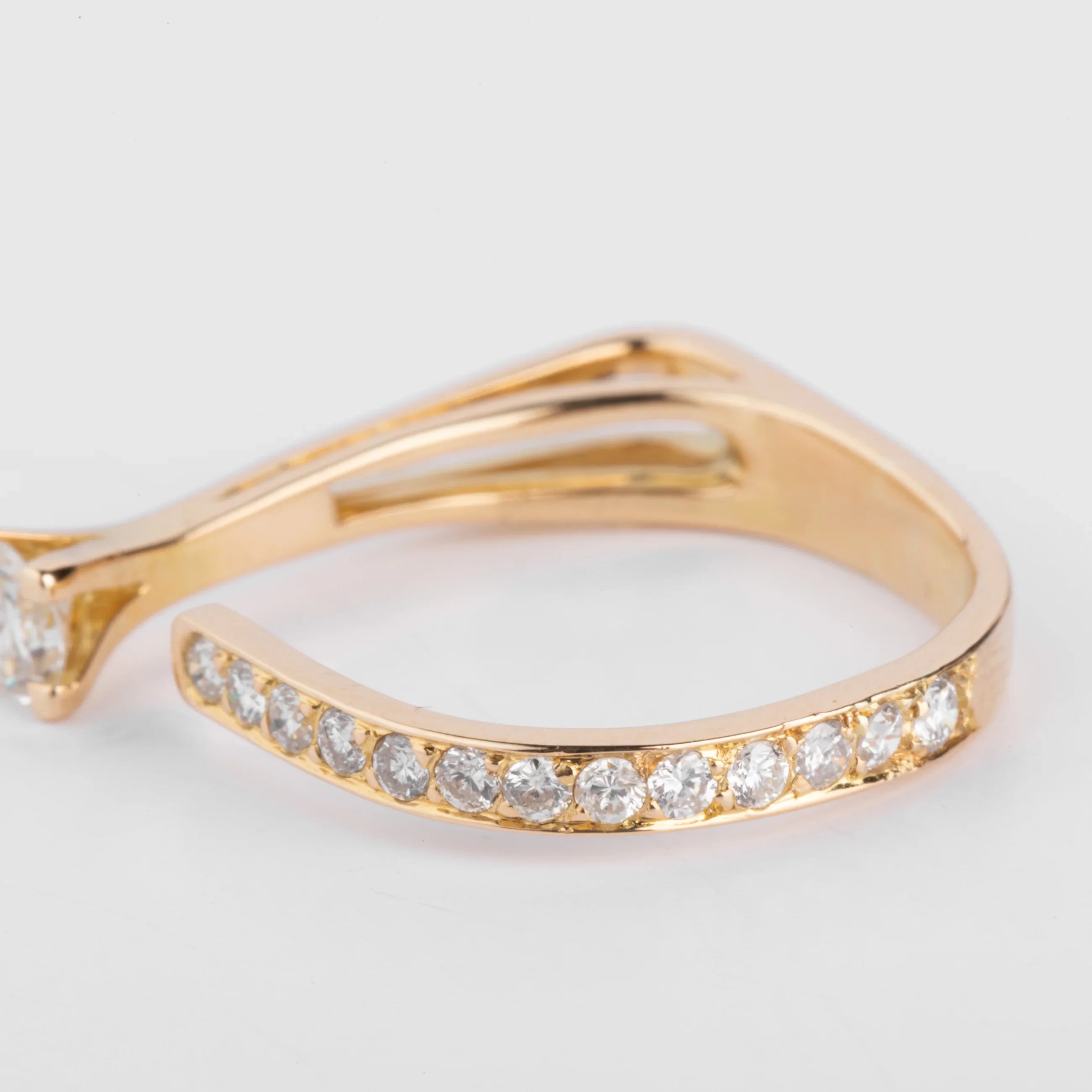Open yellow gold and diamond design ring