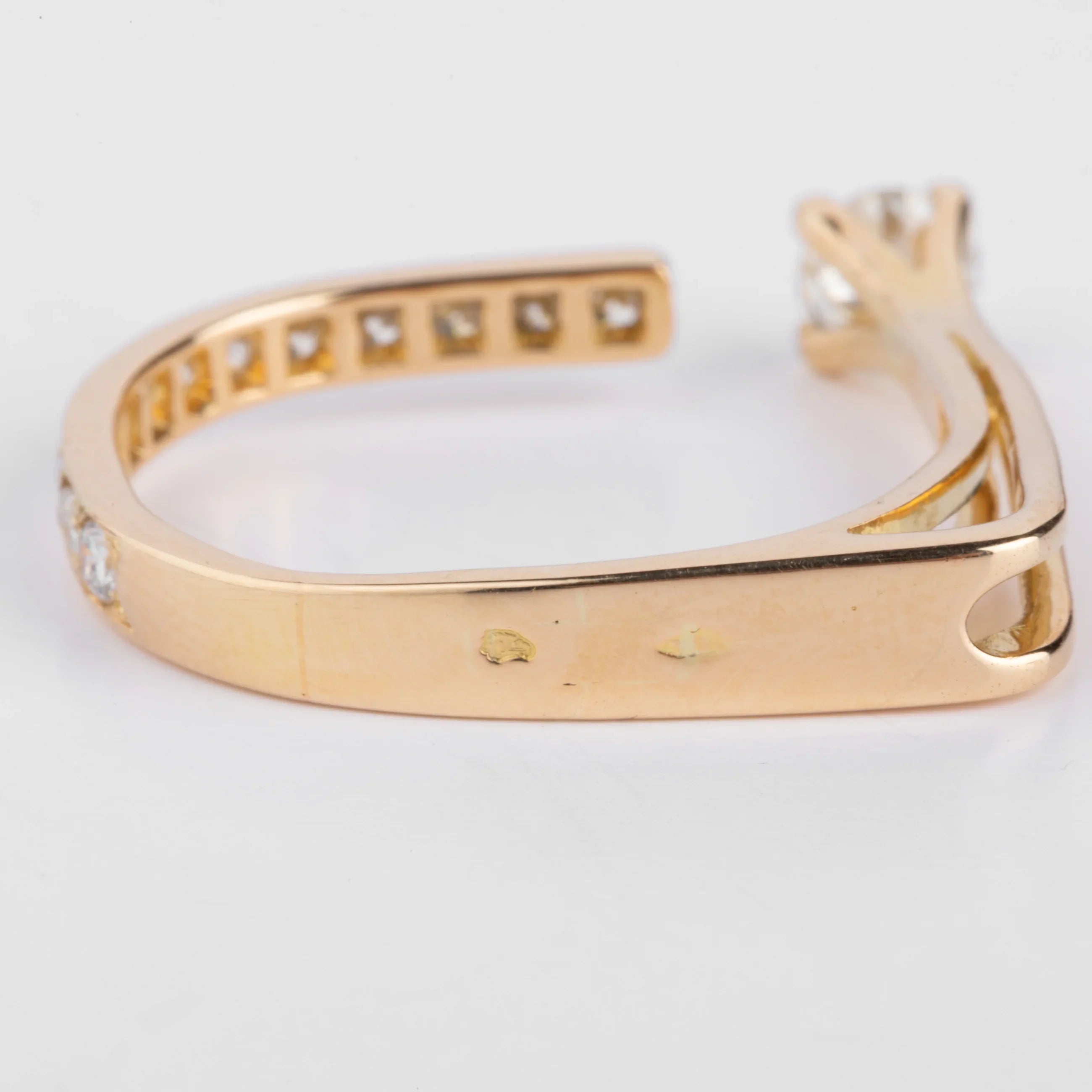 Open yellow gold and diamond design ring