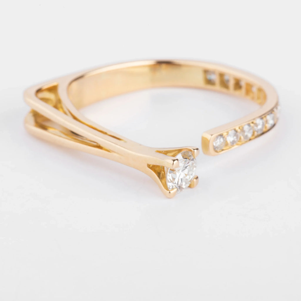 Open yellow gold and diamond design ring