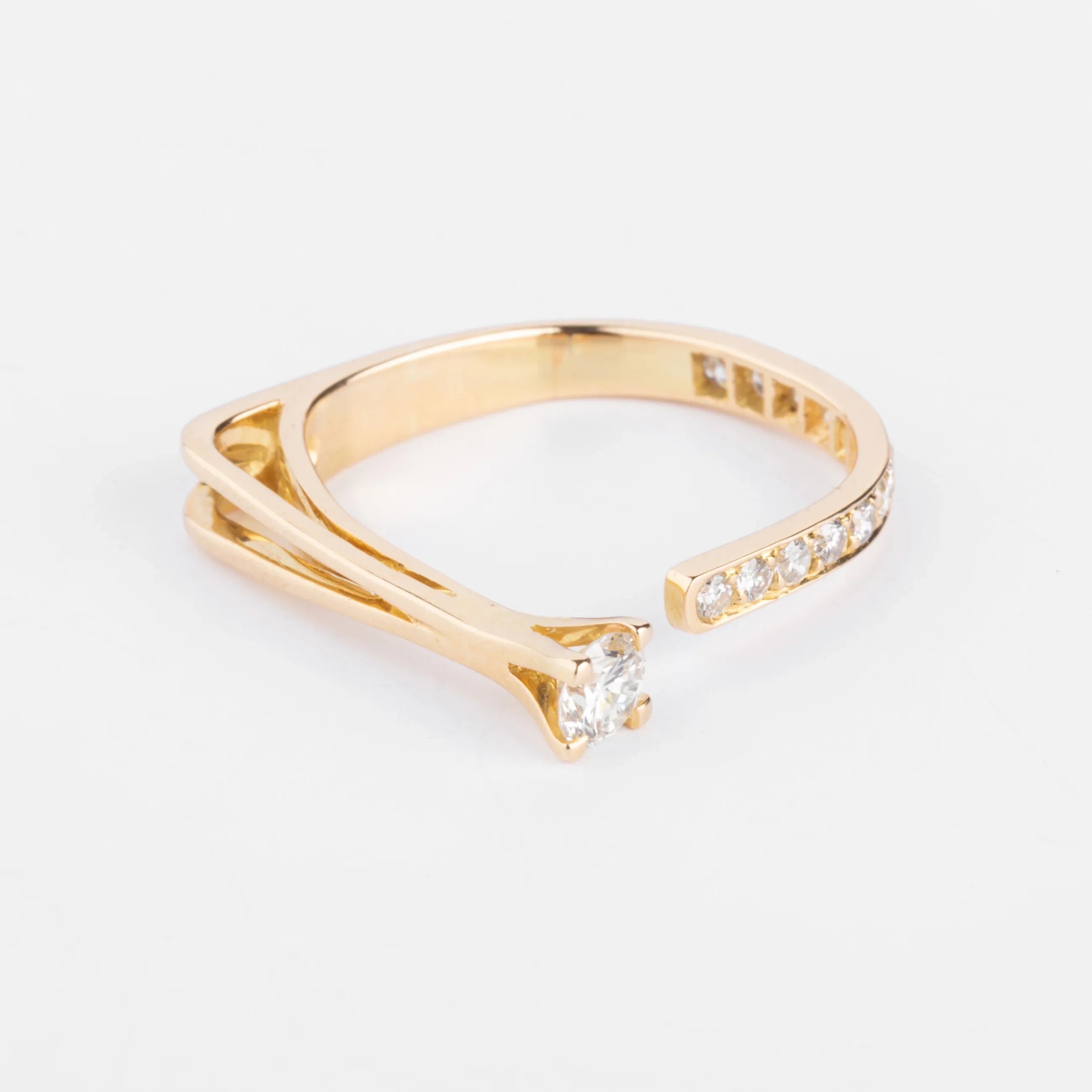 Open yellow gold and diamond design ring
