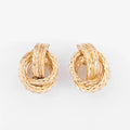Boucles d'oreilles or jaune signée Hermès