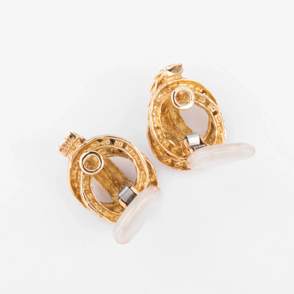 Boucles d'oreilles or jaune signée Hermès
