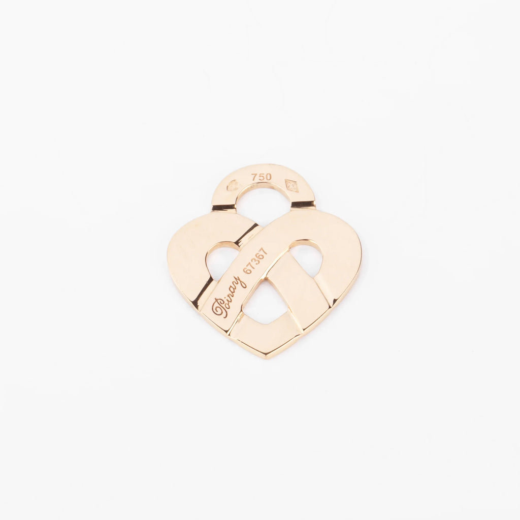 Pendentif en or jaune formant un cœur de la maison Poiray