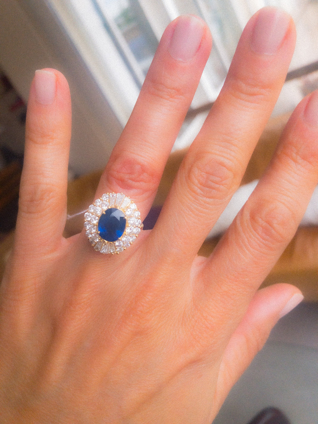 daisy ring in yellow gold with sapphire and double diamond halo
