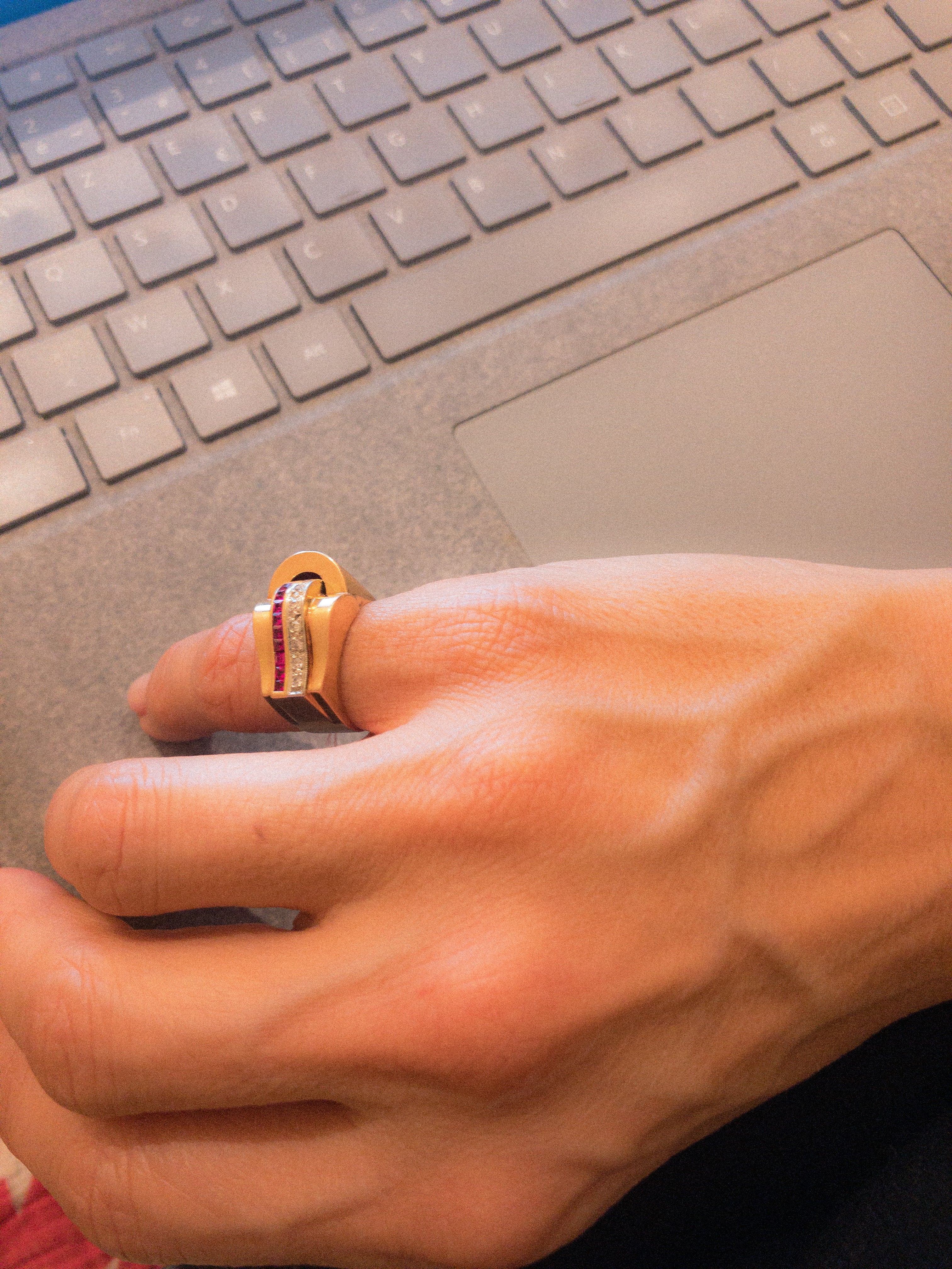 Rose gold tank ring with synthetic diamonds and rubies