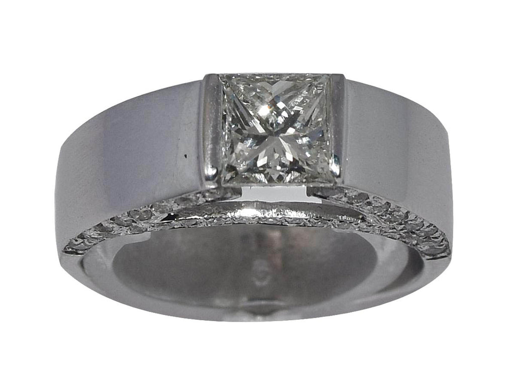 White gold solitaire ring with a princess-cut diamond