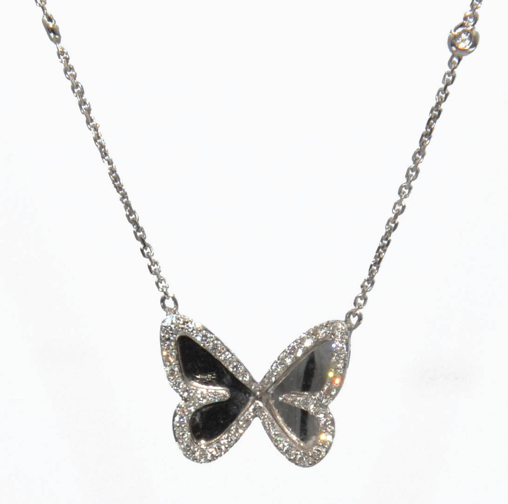 White gold diamond pendant with a butterfly pendant