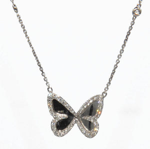 Pendentif en or gris diamants avec pendentif papillon