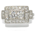 Platinum ring with a rectangular-cut diamond
