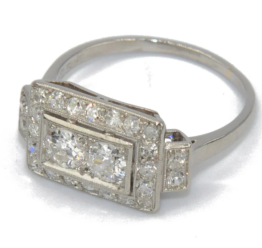 Platinum ring with a rectangular-cut diamond
