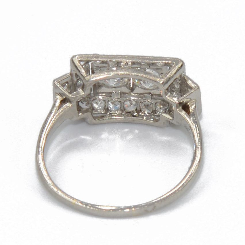Platinum ring with a rectangular-cut diamond