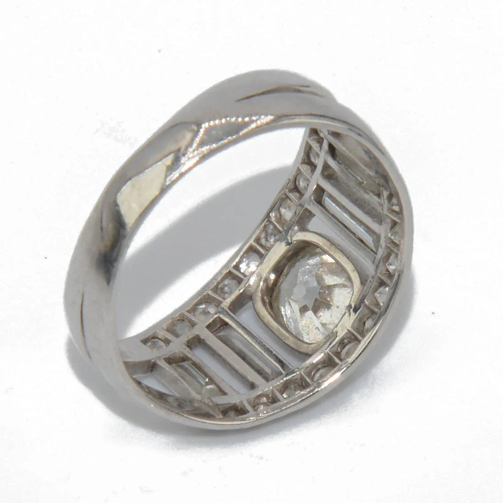 Diamond and platinum band ring