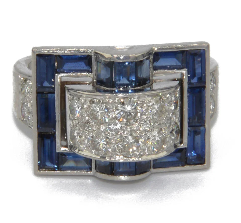 White gold ring with calibrated blue sapphires