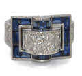 White gold ring with calibrated blue sapphires