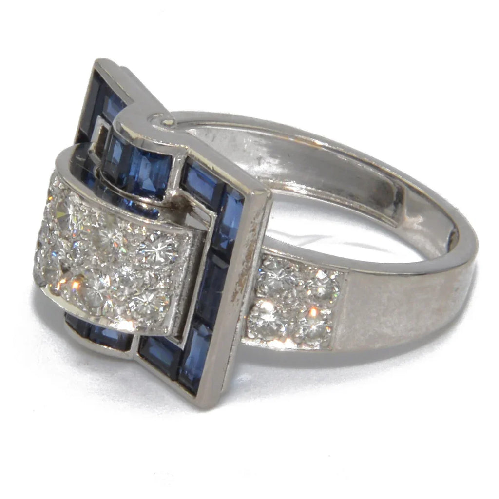 White gold ring with calibrated blue sapphires