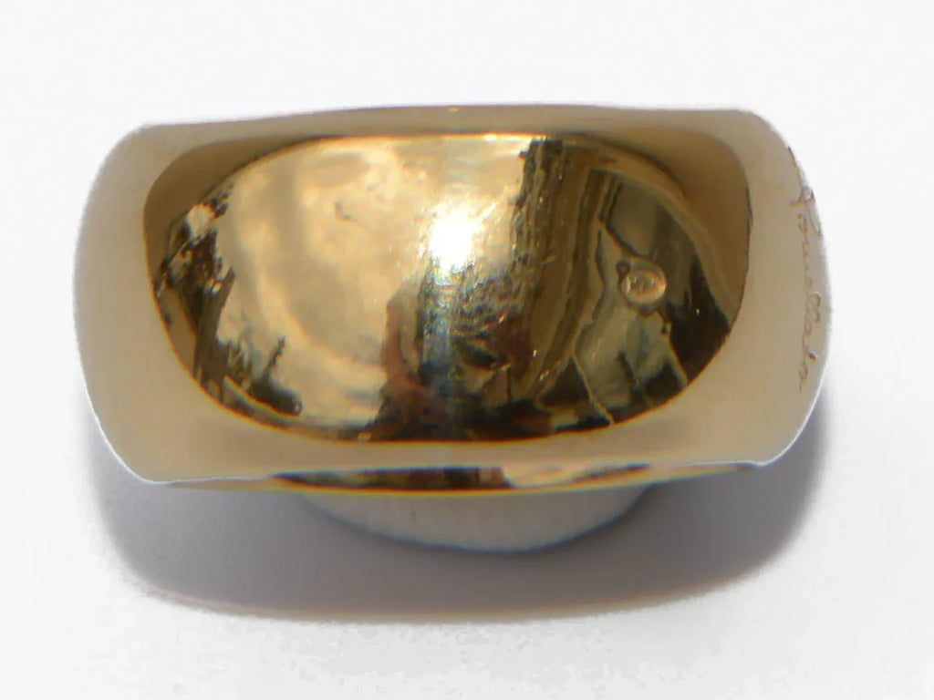 Ring signed by the house of Pomellato in yellow gold and cordierite